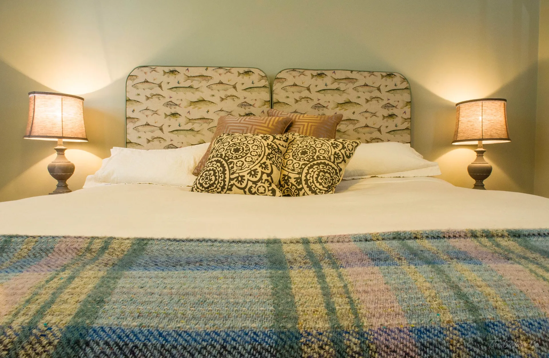 The Laundry — king bedroom with feather and down bedding