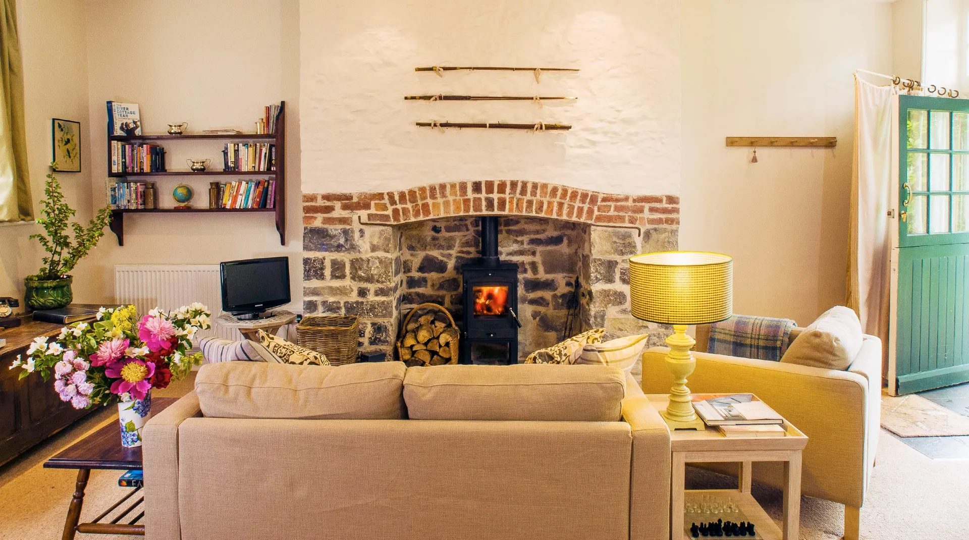 The Laundry — open-plan living room with wood burning stove